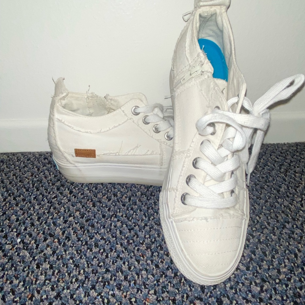 Blowfish wedged sneakers! Gives you a good 1inch lift!